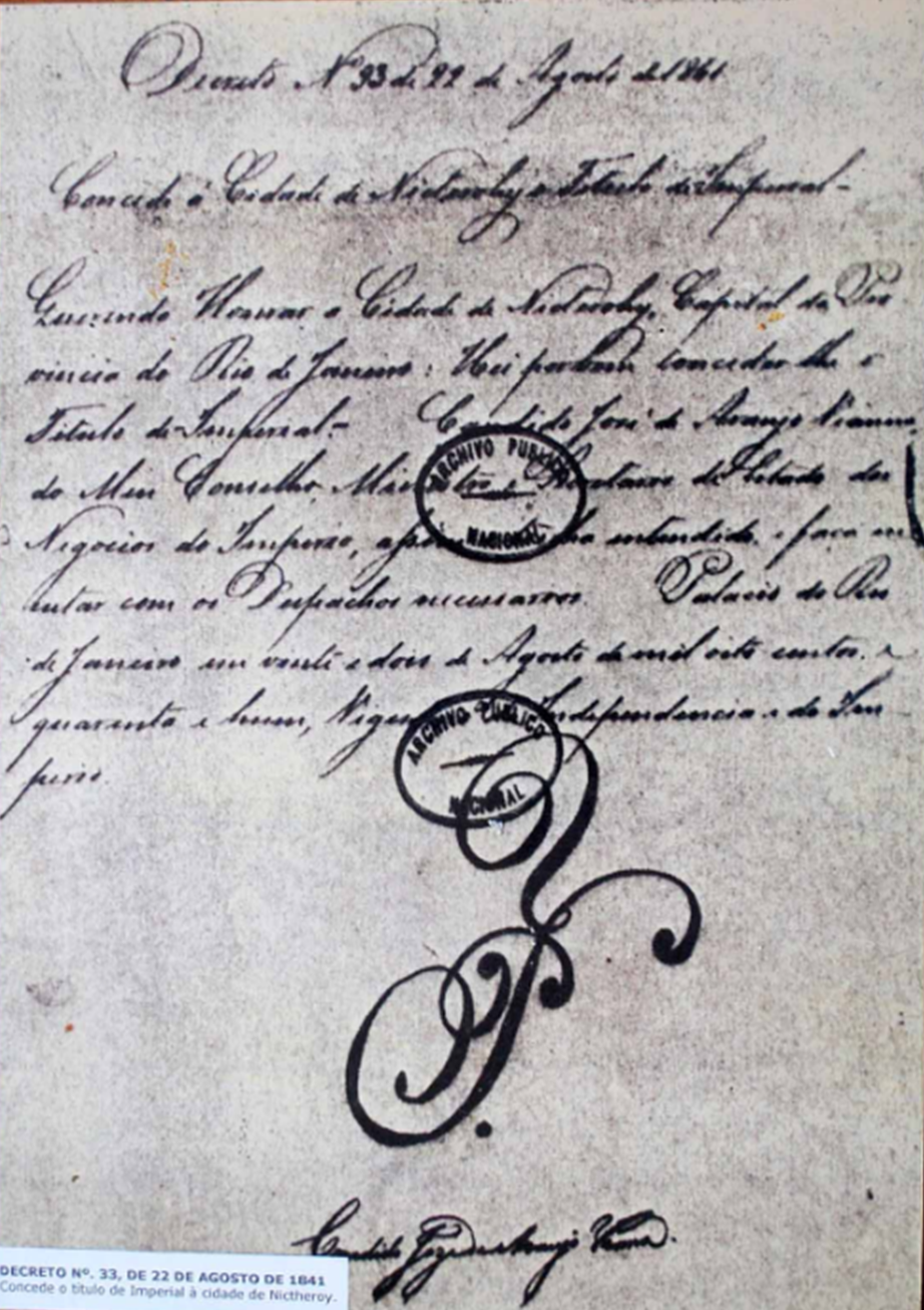 Cópia do Decreto de 1841, que concedeu o título de Imperial Cidade de Nicterohy. O original integra o acervo da Biblioteca Nacional. O documento foi assinado por Cândido José de Araújo Vianna, Ministro e Secretário de Estado dos Negócios do Império, e traz a rubrica de Sua Majestade Imperial, Dom Pedro II.