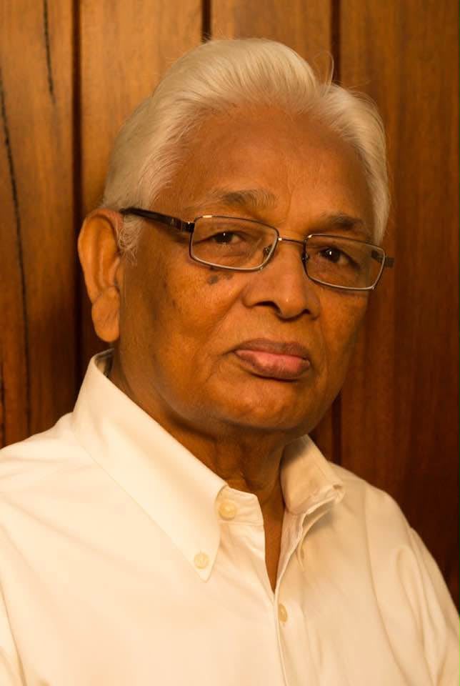 Nagaraju Ramaswamy, um indiano de meia idade, cabelos brancos e de úculos.